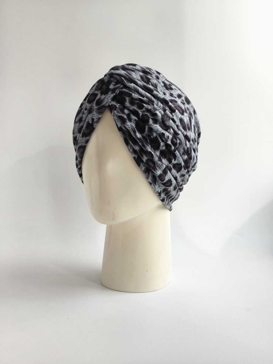 Gorro turbante cruzado - Animal print fondo acero .